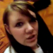 A cute girl speaks to the camera as she has a soft, noisy poop on the toilet.